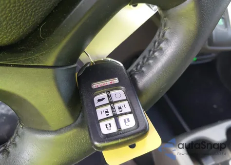 2019 Honda Odyssey Touring z USA, uszkodzony, nr VIN 5FNRL6H83KB103283